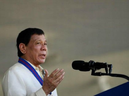 Philippine Philippine President Rodrigo Duterte gestures as he gives a speech during the 116th anniversary of the Philippine National Police (PNP) at its headquarters in Manila on August 9, 2017. / AFP PHOTO / NOEL CELIS (Photo credit should read NOEL CELIS/AFP/Getty Images)