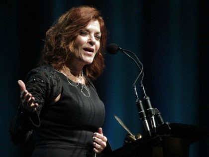 Rosanne Cash speaks at The Nashville Songwriters Hall of Fame Dinner and Induction Ceremony at the Music City Center on Sunday, Oct. 11, 2015, in Nashville, Tenn. (Photo by Wade Payne/Invision/AP)