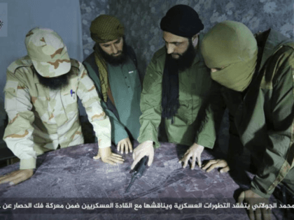 FILE -- This undated file photo, shows Abu Mohammed al-Golani, second right, then leader o