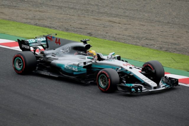 Mercedes' British driver Lewis Hamilton drives during the qualifying session of the Formul