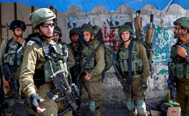 Israeli soldiers during a demonstration in the West Bank city of Hebron on September 15, 2