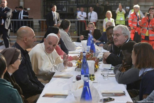 This handout picture released by the Vatican press office shows Pope Francis during a lunc