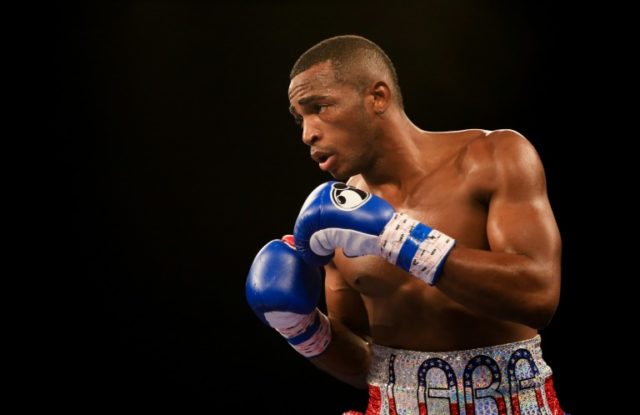 Erislandy Lara fights during the first round of the WBA World Super Welterweight Champions