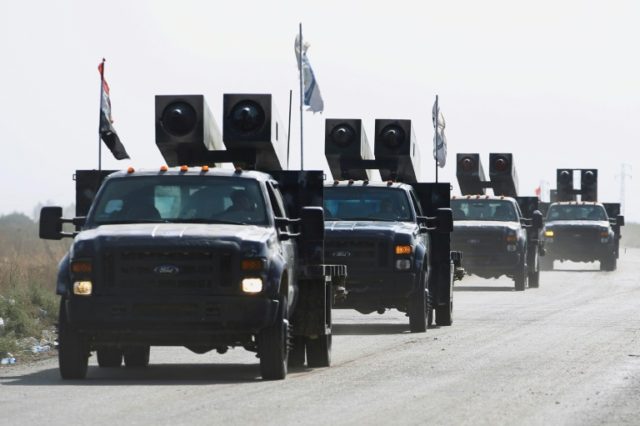 Iraqi forces drive towards Kurdish peshmerga positions on the southern outskirts of Kirkuk