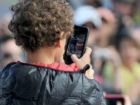 Regulators and programme makers are at odds over whether small children should be banned from watching television or using tablets and smartphones Regulators and programme makers are at odds over whether small children should be banned from watching television or using tablets and smartphones