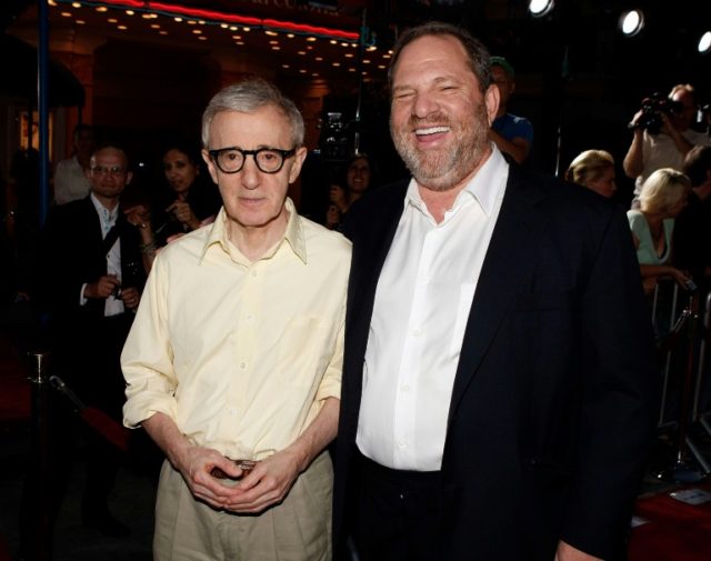 Woody Allen, seen here ith Harvey Weinstein in 2oo8, says he fells 'sad' for the film prod