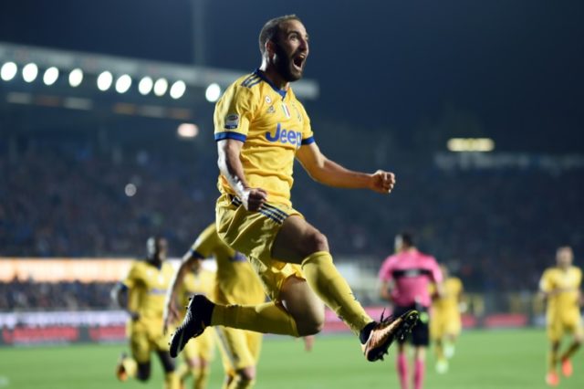 Juventus' Argentinian forward Gonzalo Higuain celebrates after scoring a goal during their