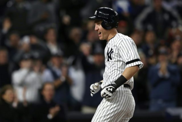 Todd Frazier of the New York Yankees celebrates hitting a 3-run home run against the Houst