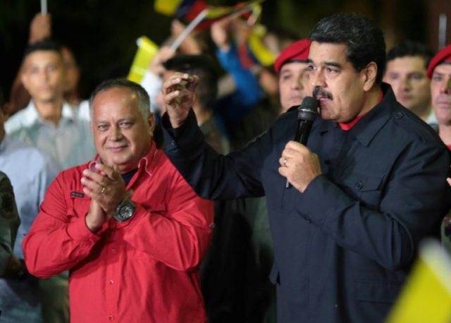 Venezuelan President Nicolas Maduro, right, claimed a landslide victory in crucial regiona