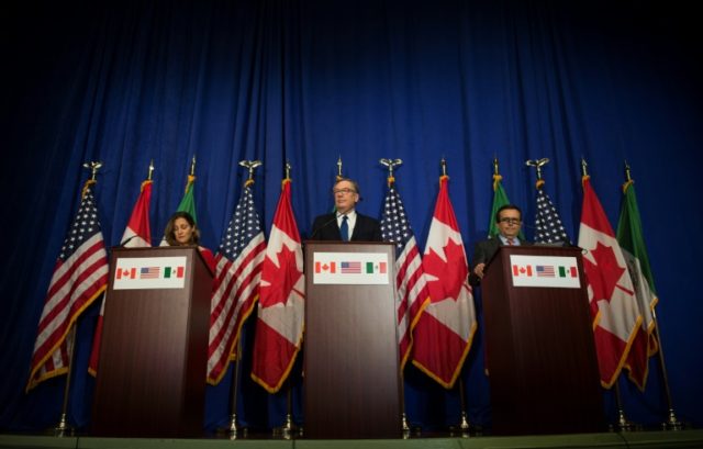 US Trade Representative Robert Lighthizer (C), Canadian Foreign Minister Chrystia Freeland