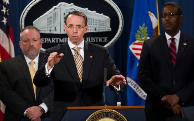 US Deputy Attorney General Rod Rosenstein (C) announces indictments to stop fentanyl and o