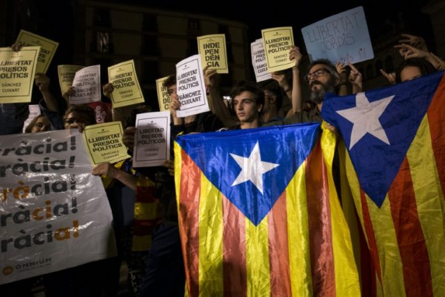 Protesters in Barcelona are calling for "freedom for political prisoners"