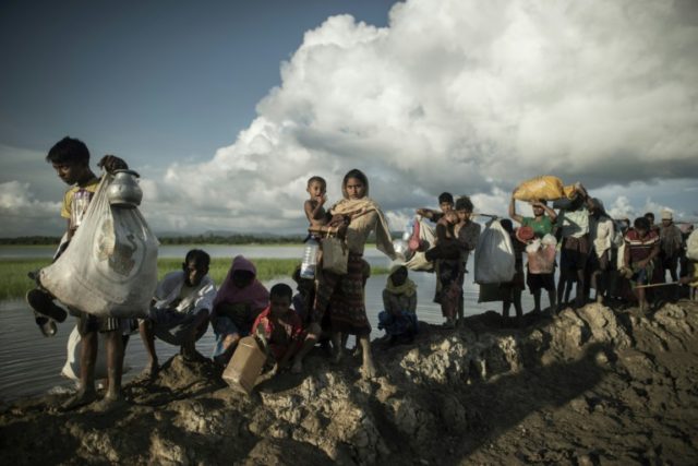 Rohingya refugees walking into Bangladesh from Myanmar
