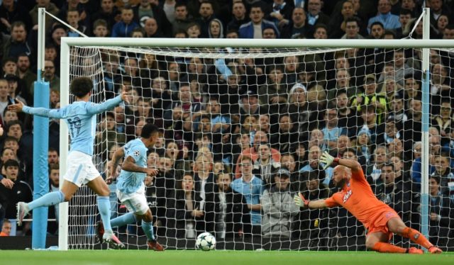 Manchester City's striker Gabriel Jesus (2ndL) scores his team's second goal against Napol