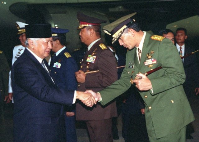 General Suharto (L) put down the failed coup in 1965, blamed the Indonesian Communist Part