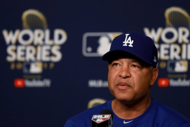 Manager Dave Roberts of the Los Angeles Dodgers answers questions from the media ahead of