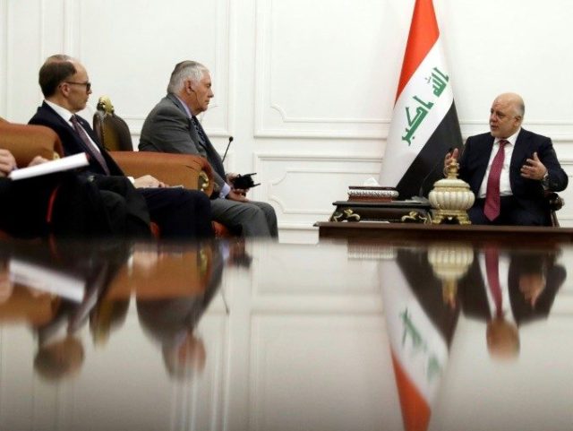 US Secretary of State Rex Tillerson (2nd L) meets with Iraq's Prime Minister Haider al-Aba