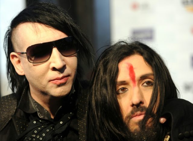 Marilyn Manson (L), pictured in 2010 with longtime band member Jeordie White, says he will