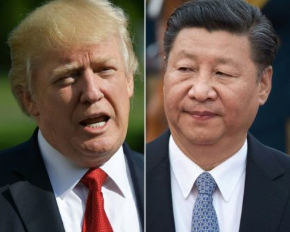 US President Donald Trump speaks by telephone with Chinese leader Xi Jinping, who used a l