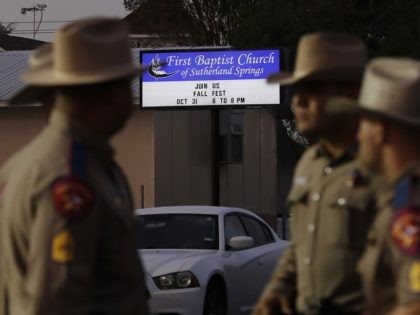 Law enforcement officials work at the scene of a shooting at the First Baptist Church of Sutherland Springs, Monday, Nov. 6, 2017, in Sutherland Springs, Texas. A man opened fire inside the church in the small South Texas community on Sunday, killing and wounding many. (AP Photo/Eric Gay)