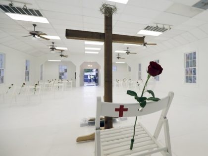 A memorial for the victims of the shooting at Sutherland Springs First Baptist Church includes 26 white chairs, each painted with a cross and and rose, is displayed in the church Sunday, Nov. 12, 2017, in Sutherland Springs, Texas. A man opened fire inside the church in the small South …
