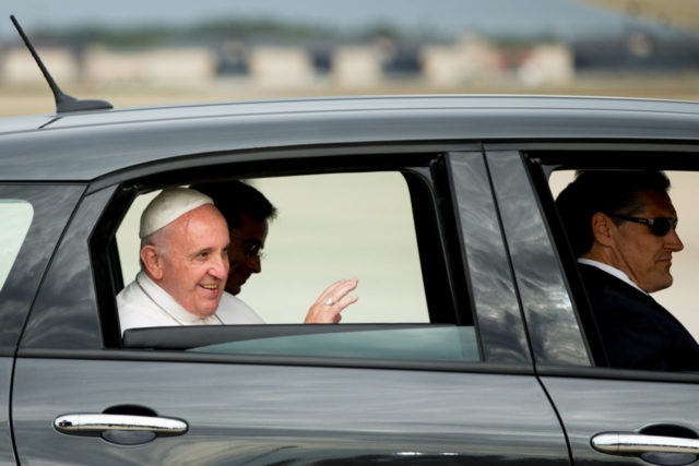 In this Sept. 22, 2015, file photo, Pope Francis waves from a Fiat 500L as his motorcade departs Andrews Air Force Base, Md. ,after being greeted by President Barack Obama and first lady Michelle Obama. One of the two Fiats used by Pope Francis during this visit to Philadelphia last …