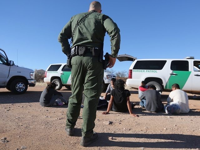 Border Patrol agent arrests illegal immigrants in Arizona.