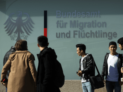 BERLIN, GERMANY - MARCH 27: Young men from Afghanistan who were arriving to participate in a demonstration against deportations gather near the Federal Office for Migrants and Refugees on March 27, 2017 in Berlin, Germany. The protesters were demanding an end to the deportations of migrants and refugees from Afghanistan …