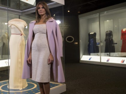 US First Lady Melania Trump stands alongside the gown she wore to the 2017 inaugural balls