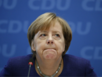 GettyImages-865297222 German Chancellor Angela Merkel attends a meeting of the federal executive board of the Christian Democratic Union (CDU) in Berlin, on October 23, 2017 on the eve of further exploratory talks between potential coalition partners. / AFP PHOTO / Odd ANDERSEN (Photo credit should read ODD ANDERSEN/AFP/Getty Images)