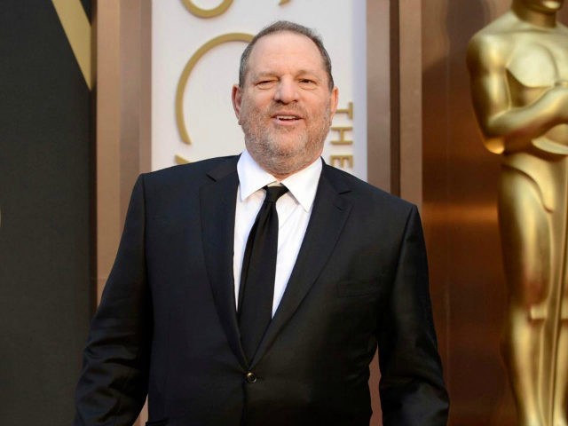 In this March 2, 2014 file photo, Harvey Weinstein arrives at the Oscars in Los Angeles. D