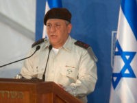 Israel's new Chief of Staff Gadi Eisenkot delivers a speech during his swearing-in ceremony at the Prime Minister's Jerusalem offices on February 16, 2015. AFP PHOTO / MENAHEM KAHANA (Photo credit should read MENAHEM KAHANA/AFP/Getty Images)