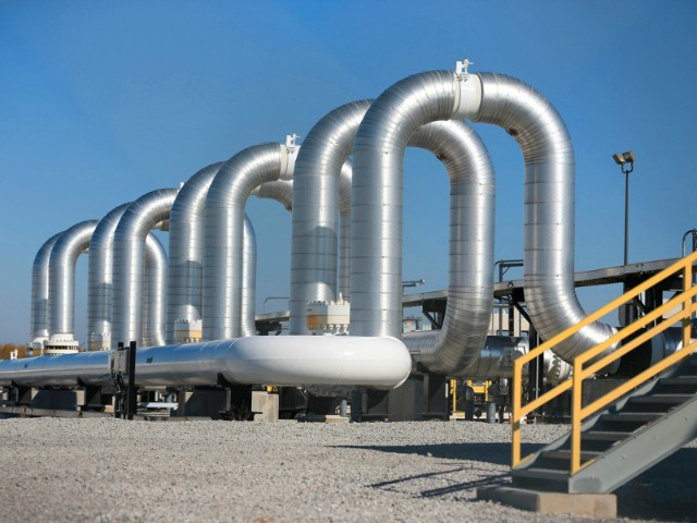 In this Nov. 3, 2015, photo, the Keystone Steele City pumping station, into which the planned Keystone XL pipeline is to connect to, is seen in Steele City, Neb. The Obama administration says Nov. 4, it is continuing a review of the proposed Keystone XL oil pipeline, despite a request by the project's developer to suspend the review. (AP Photo/Nati Harnik)