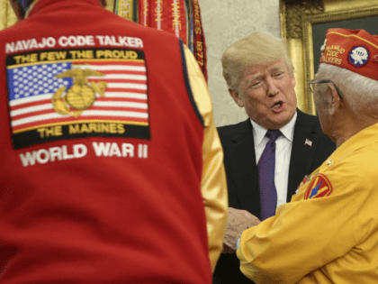 U.S. President Donald Trump (R) greets members of the Native American code talkers during an event in the Oval Office of the White House, on November 27, 2017 in Washington, DC. Trump stated, 'You were here long before any of us were here. Although we have a representative in Congress …