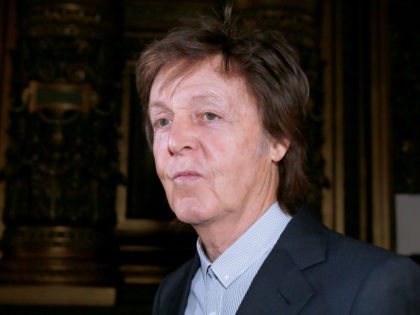 Former Beatle member and recording artist Sir Paul McCartney attends his daughter Stella McCartney's 2016-2017 fall/winter ready-to-wear show on March 7, 2016 in Paris. AFP PHOTO / PATRICK KOVARIK / AFP / Patrick KOVARIK (Photo credit should read PATRICK KOVARIK/AFP/Getty Images)