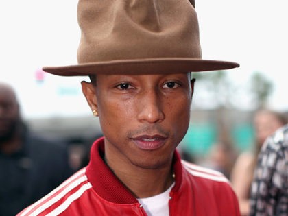 LOS ANGELES, CA - JANUARY 26: Recording artist Pharrell Williams attends the 56th GRAMMY A