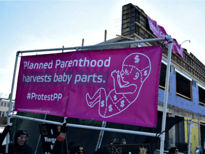 Planned Parenthood harvests baby parts sign