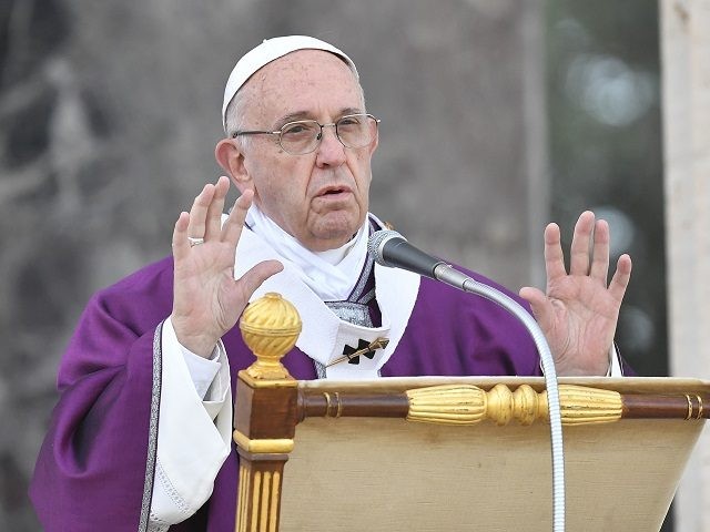 Pope Francis leads a mass on November 2, 2017 at the U.S. World War II cemetery on the day Christians around the world commemorate their dead, in Nettuno, near Rome, on November 2, 2017. Pope Francis will celebrate a mass at the American cemetery today before a visit at the …