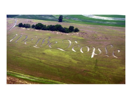 "We the People," the beginning of the preamble of the U.S. Constitution, is seen cut into a wheat field on the farm of Jack Coleman in Ronks, Pa., Thursday, June 26, 2003. (AP Photo/Chris Gardner)