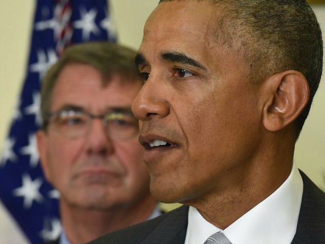 Defense Secretary Ash Carter listens at left as President Barack Obama makes a statement o