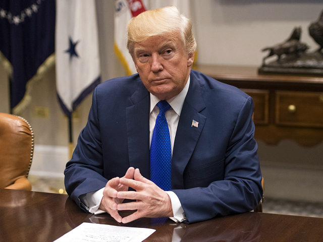 WASHINGTON, DC - NOVEMBER 28: (AFP OUT) U.S. President Donald Trump speaks to the media during a meeting with congressional leadership in the Roosevelt Room at the White House on November 28, 2017 in Washington, DC. Trump spoke on the recent intercontinental ballistic missile launch by North Korea. Democratic leaders …