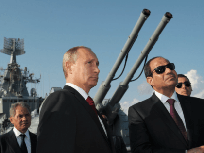 FILE In this file photo taken on Tuesday, Aug. 12, 2014, Russian President Vladimir Putin, left, and Egyptian President Abdel-Fattah el-Sissi, visit missile cruiser Moskva ( Moscow) in the Russian Black Sea resort of Sochi, Russia. Russia is negotiating an agreement with Egypt that would allow its warplanes to use …