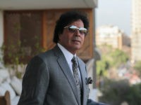 Ahmed Qaddaf al-Dam, cousin of Libya's former president Muammar Gaddafi, poses for a photo during an interview at his apartment, in Cairo, Egypt, Wednesday, Feb. 25, 2015. (AP Photo/Mosa'ab Elshamy)