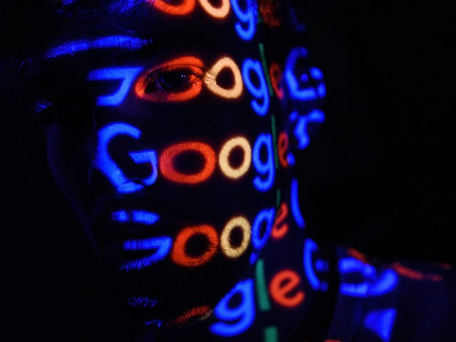 LONDON, ENGLAND - AUGUST 09: In this photo illustration, The Google logo is projected onto a man on August 09, 2017 in London, England. Founded in 1995 by Sergey Brin and Larry Page, Google now makes hundreds of products used by billions of people across the globe, from YouTube and …