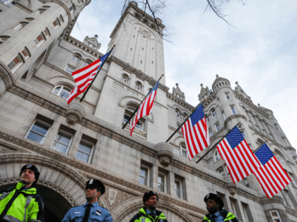 Police stand guard outside the Trump International Hotel on Pennsylvania Avenue in Washing