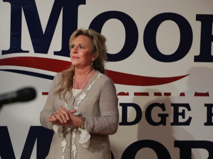 FAIRHOPE, AL - SEPTEMBER 25: Kayla Moore, the wife of Republican candidate for the U.S. Senate in Alabama Roy Moore, listens as her husband speaks at a campaign rally on September 25, 2017 in Fairhope, Alabama. Moore is running in a primary runoff election against incumbent Luther Strange for the …