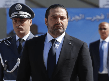 In this photo taken on Friday, Sept. 8, 2017, Lebanese Prime Minister Saad Hariri, left, arrives for a mass funeral of ten Lebanese soldiers at the Lebanese Defense Ministry, in Yarzeh near Beirut, Lebanon. Lebanese prime minister Saad Hariri has announced he is resigning in a surprise move following a …