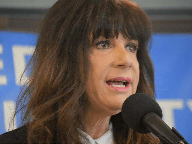 Leslie Millwee, a social worker who says she was sexually assaulted by former President Bill Clinton, spoke at a press conference in Washington, D.C. on Wednesday. She and other victims of sexual harassment or assault called on transparency in Congress and for members accused of misdeeds to step down. (Penny Starr/Breitbart News)