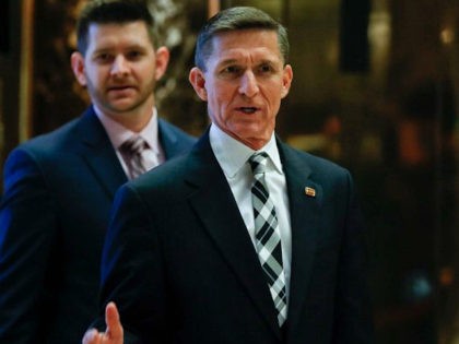 FILE - In this Nov. 17, 2016 file photo, Retired Lt. Gen Michael Flynn talks to media as h