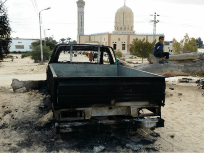 A burned truck is seen outside Al-Rawda Mosque in Bir al-Abd northern Sinai, Egypt a day after attackers killed hundreds of worshippers, on Saturday, Nov. 25, 2017. Friday's assault was Egypt's deadliest attack by Islamic extremists in the country's modern history, a grim milestone in a long-running fight against an …